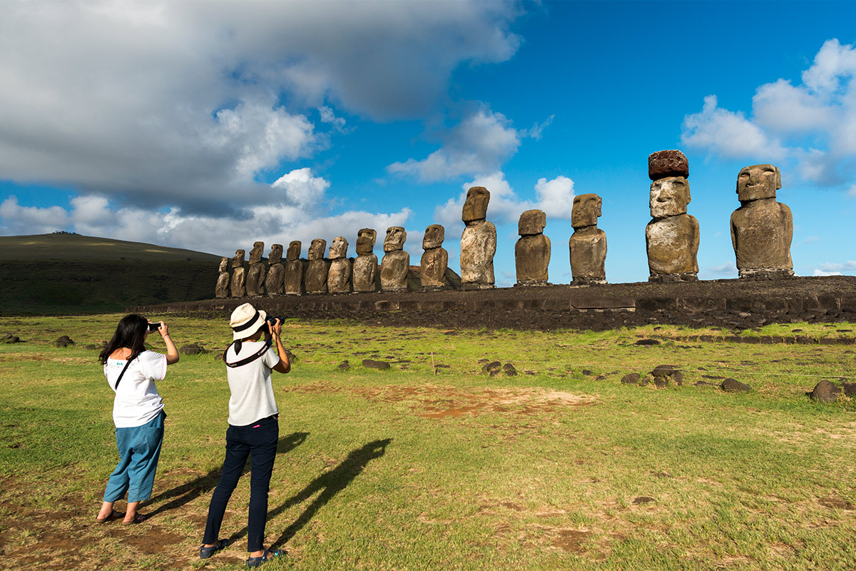 Tourists by Ahu Tongariki during Easter Island tour